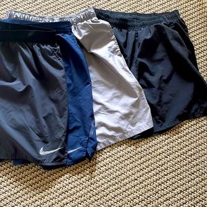 Nike shorts size medium- 4 pair